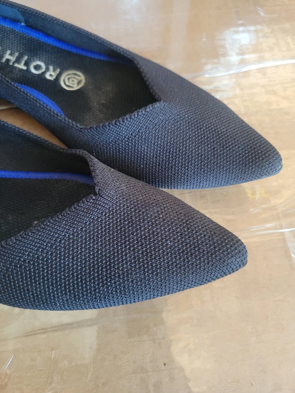 Rothy's Black Pointed Ballet Flat with Blue Trim